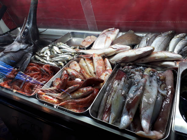 Sea food restaurant in Algiers A variety of fresh fishes in a sea food restaurant in Algiers, Algeria. kabylie stock pictures, royalty-free photos & images