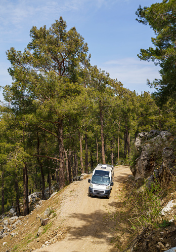 Motorhome driving through forest road near Antalya, Turkey