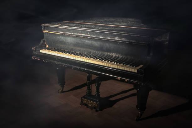 istock Old grand piano on the stage 1394854031