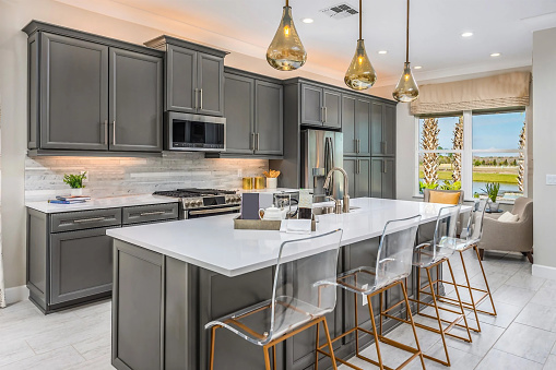 Beautiful gourmet kitchen in a home with an open concept floor plan.
