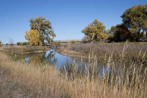A river runs through the prairie near Fort Laramie Wyoming