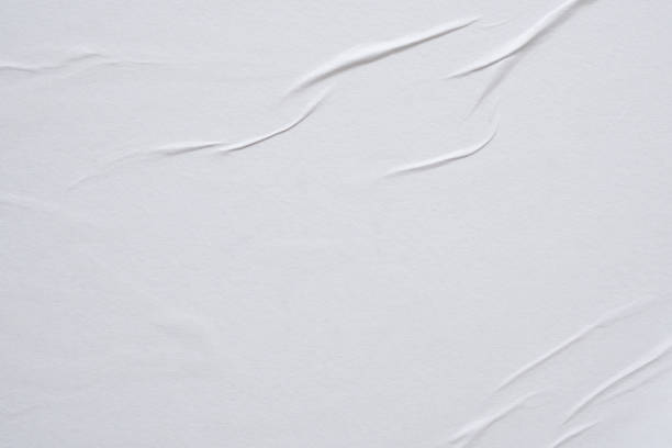 istock white crumpled and creased paper poster texture background 1394859682