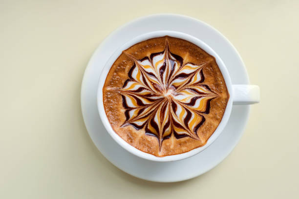 istock latte art coffee or cappuccino isolate on white table background 1394859900