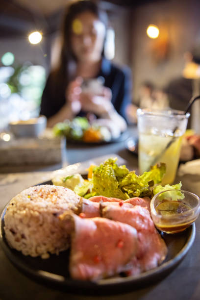 istock Lunch at travel location - roast beef, salad with rice 1394861143
