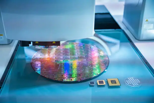 Photo of Silicon Wafers and Microcircuits with Automation system control application