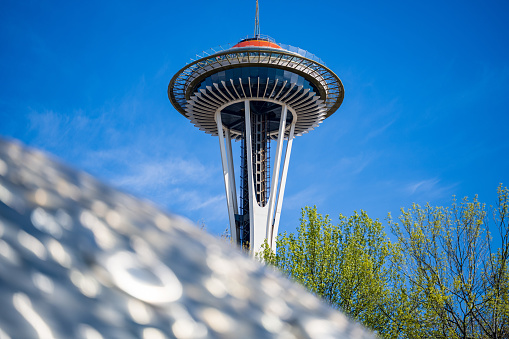 Seattle, Washington, U.S.A-  April 30, 2022: Seattle Center is a popular tourist destination where people enjoy many cultural amenities and viewing the Space Needle and International  Fountain.