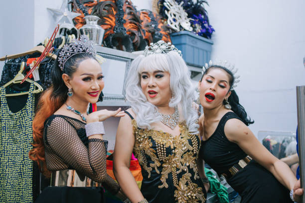 istock Asian LGBT drag queen stage performance posing in front of camera at backstage make up before performance at pub 1394869195