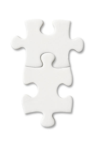 Close-up shot of Jigsaw puzzles pieces on white background.
