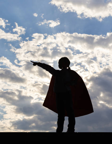A man with a cape, arm raised high, symbolizing victory or leadership. 3D rendering, conceptual image. Isolated on white background.