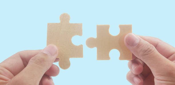 istock Connecting jigsaw puzzle. Business solutions success 1394885171
