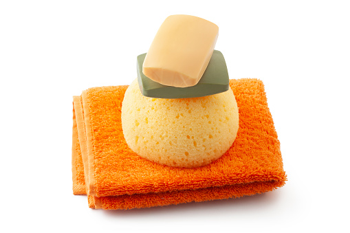 Soap, sponge and towel isolated on white background.