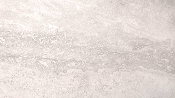 istock cream breccia travertine marble background with blank space for design. tile floor background, abstract wallpaper. light brown marble,quartz texture backdrop (focused at center o image). 1394887716