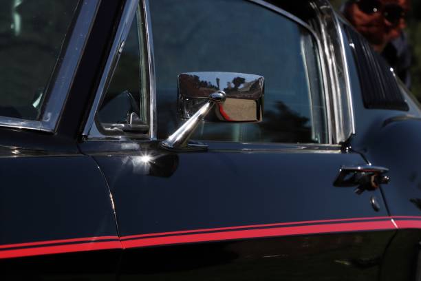 istock Classic car mirror detail 1394888918