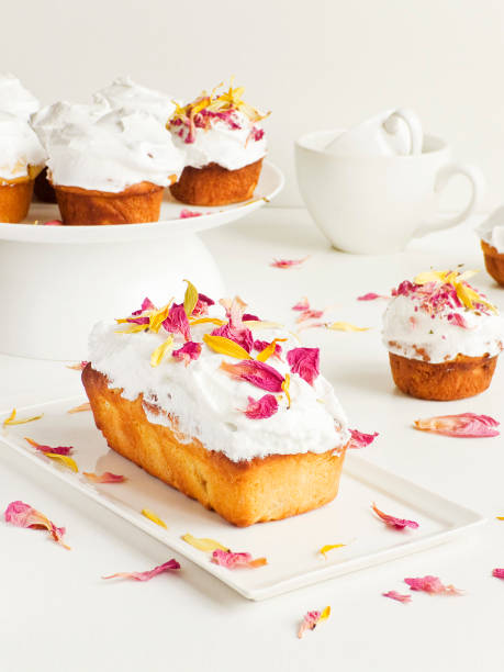 istock Mini loaf cake with whipped cream 1394890812