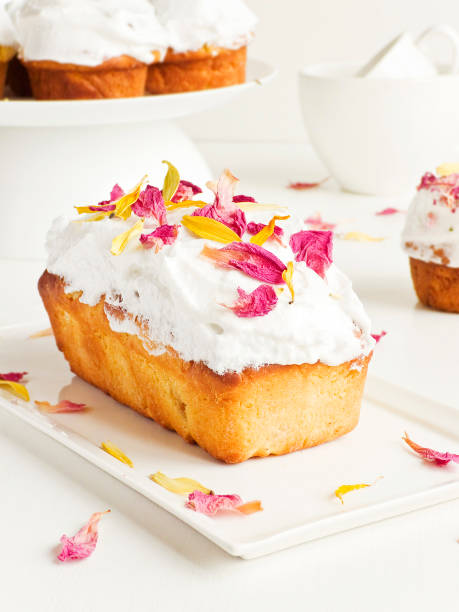 istock Mini loaf cake with whipped cream 1394890824