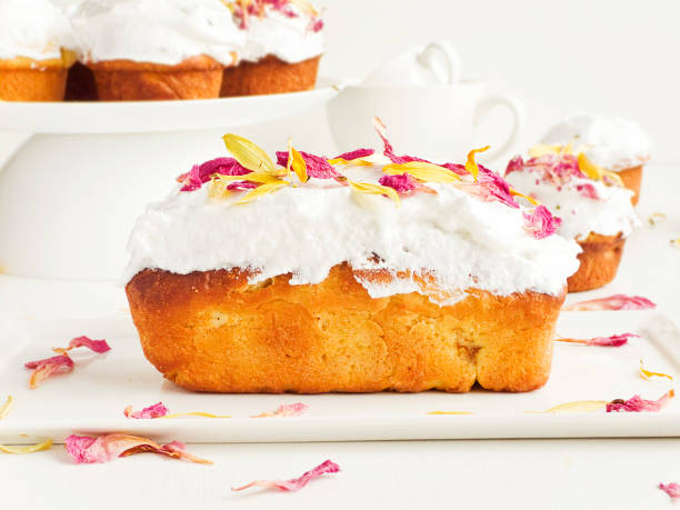 istock Mini loaf cake with whipped cream 1394890854