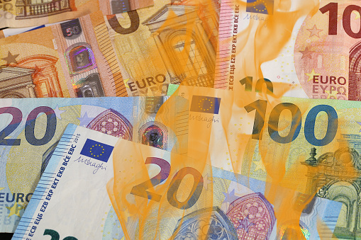 Euro notes close-up:  Macro image of two €50 banknotes, with focus on the map of Europe.