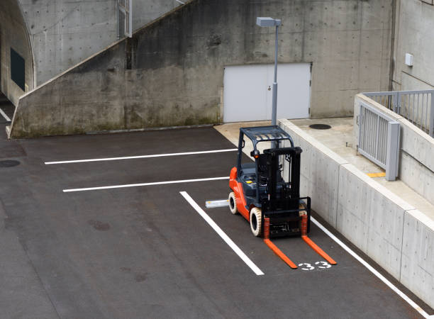istock Forklift parking in factory 1394896764