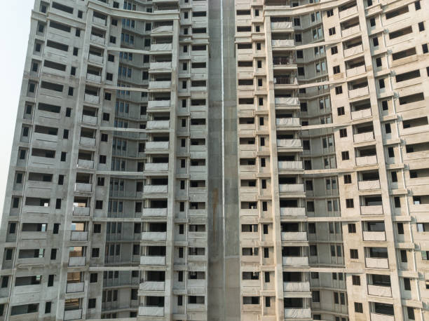 istock Aerial view of multistory apartment construction site in China 1394899363