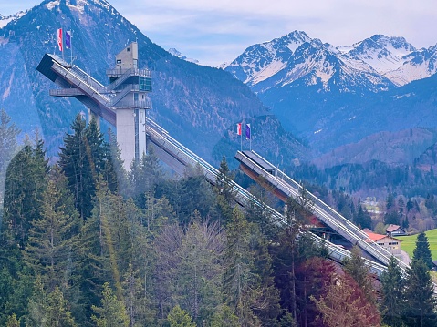 Oberstdorf, Germany - April, 29 - 2022: Ski jumping Audi Arena seen from the Nebelhorn Bahn.