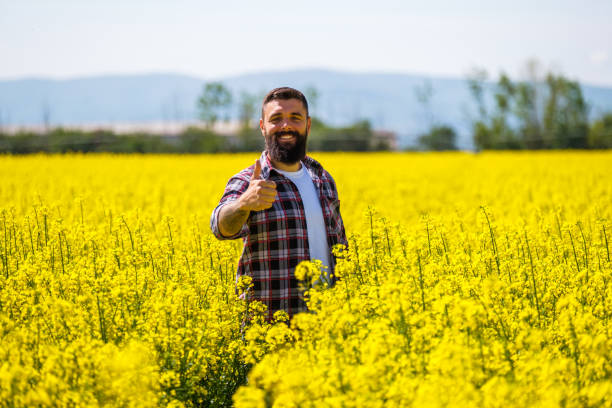 istock Farmer cultivating land 1394904088