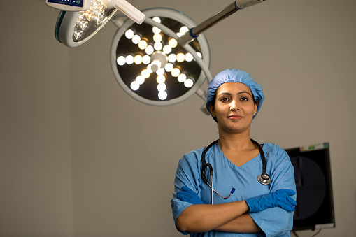 Portrait of female surgeon at hospital operating room