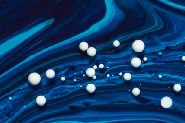 Close up of splashing creamy blue salt flavor drink