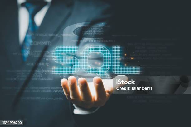 Businessman Hand Showing Sql Word And Sql Code On Background Stock ...