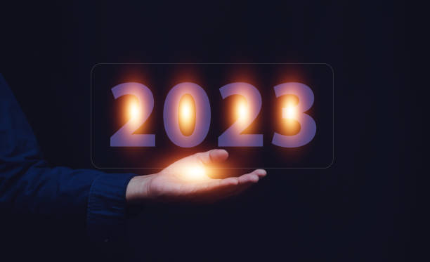 istock Hand holding 2023 concept for business planning target success 1394906360