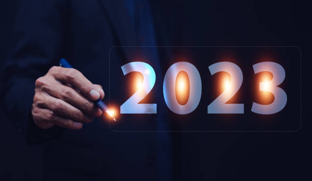 istock Hand writing 2023 concept for business planning target success 1394906438