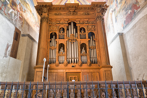 Big wooden pipe organ at the church of Santa Maria del Sasso in Vico Morcote, Canton Ticino, Switzerland, on Lake Lugano. The church of Santa Maria del Sasso dating back to the 13th century. Morcote is a municipality in the Swiss canton of Ticino in the district of Lugano