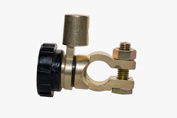 istock Brass battery terminal cut-off switch on car battery. Part L Shape 1394907571