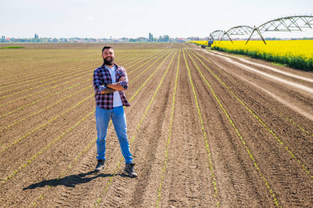 istock Farmer cultivating land 1394907841