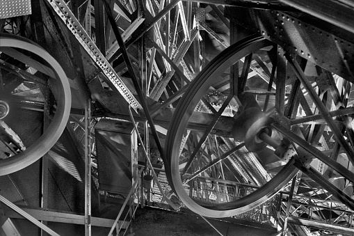 Elevator pulleys inside one of the corner pylons of the Eiffel Tower; this is a view you’ll only enjoy if you take the stairs.