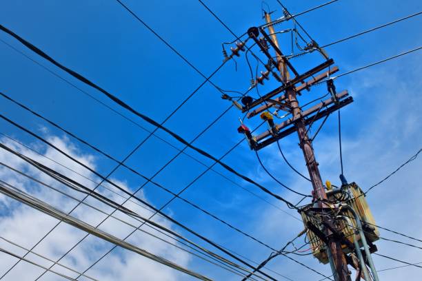istock Electric pole and electric cable 1394916638