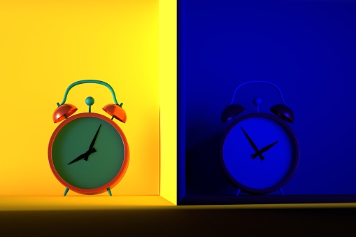 Circadian rhythm concept. alarm clock divided into two parts with day and night. Sleep and activity mode, biorhythms.3D render.