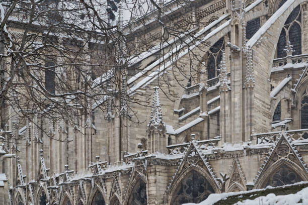 istock Notre-Dame’s flying buttresses under the falling snow 1394921881
