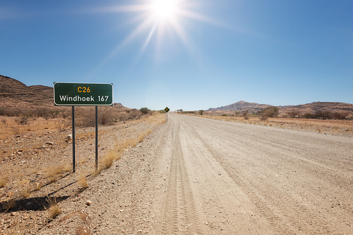 Directional sign in Namibia, Africa. The sign is located in the Gamsberg Nature Reserve on the Main Street C26 to Windhoek at 167 kilometer