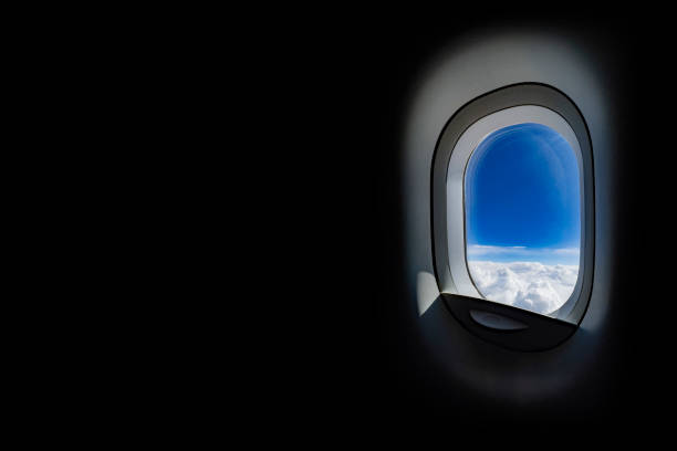 mid air view on blue sky trough porthole, black copy space - cloud mid air cloudscape aerial view imagens e fotografias de stock