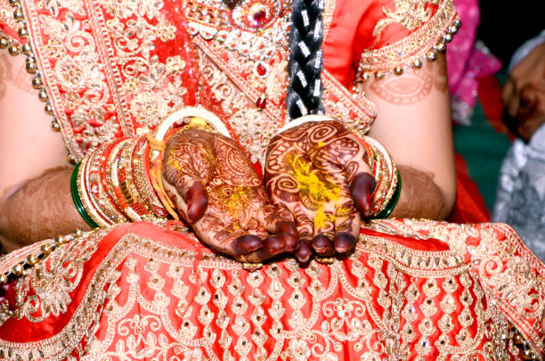 istock Indian bride showing mehndi tattoos design 1394925351