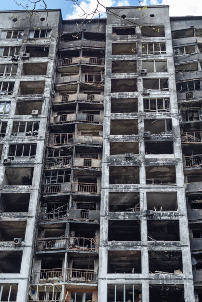 istock Destroyed and burnt multi-storey residential building 1394926885