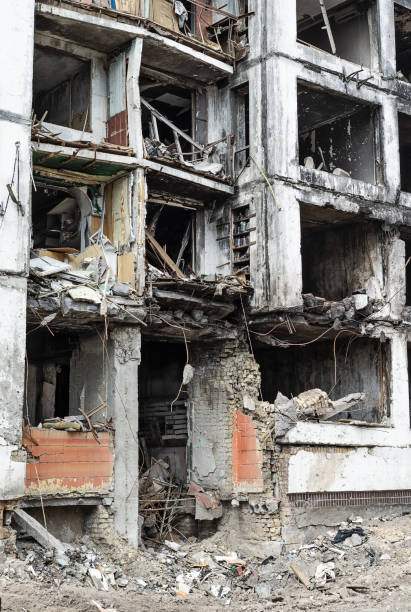 istock Destroyed residential building after shelling 1394926887
