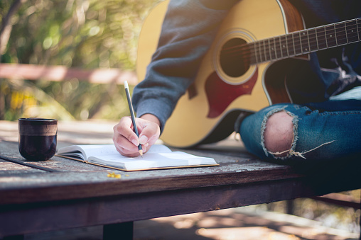 Music creator, Music composer's work area in nature, Close-up