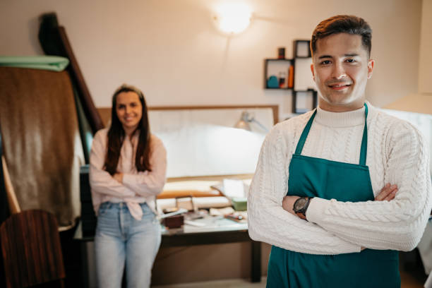 istock Man and women in his workshop 1394930032