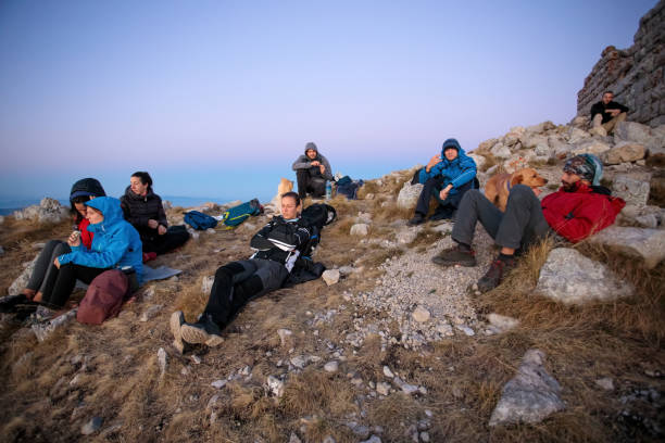 Free Stock Photo of Group of People Sitting on Top of a Mountain ...