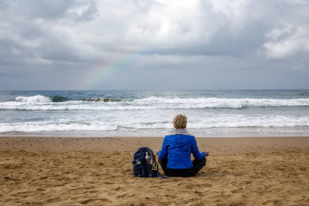 istock Meditation by the sea 1394932029