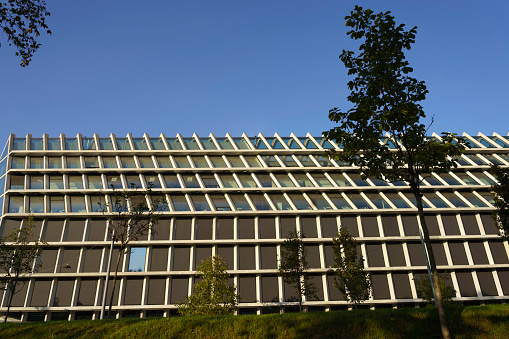 Milan, Italy - October 12, 2021: Milan, Lombardy, Italy: the modern Feltrinelli building along the Pasternak promenade