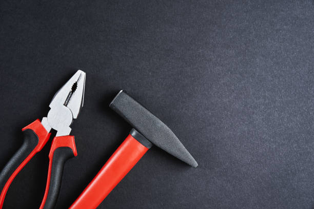 istock Set of tools for repair and maintenance on black background 1394939047