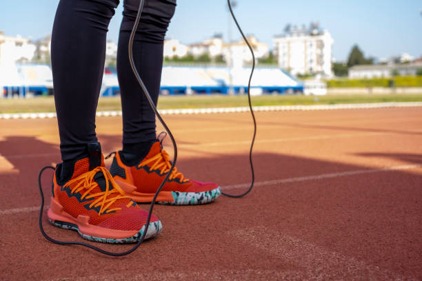 istock young athlete sneakers on running track with rope 1394939133