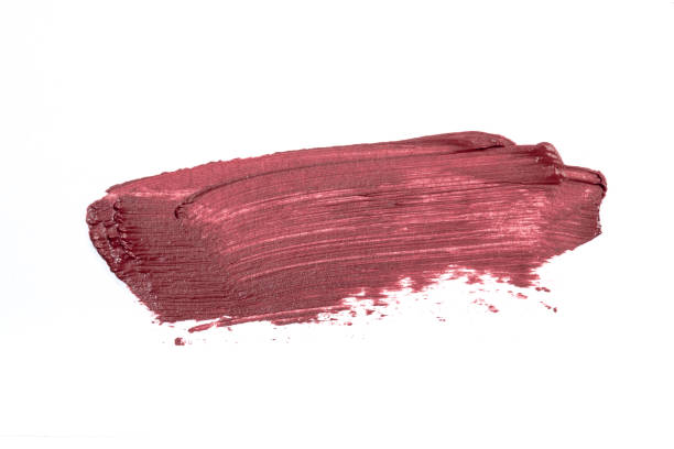 istock Lip stick pink red orande smudge background texture 1394941098